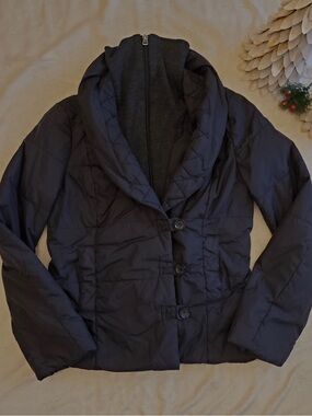 Down-filled black ladies winter jacket. Brand: Xandres from Belgian